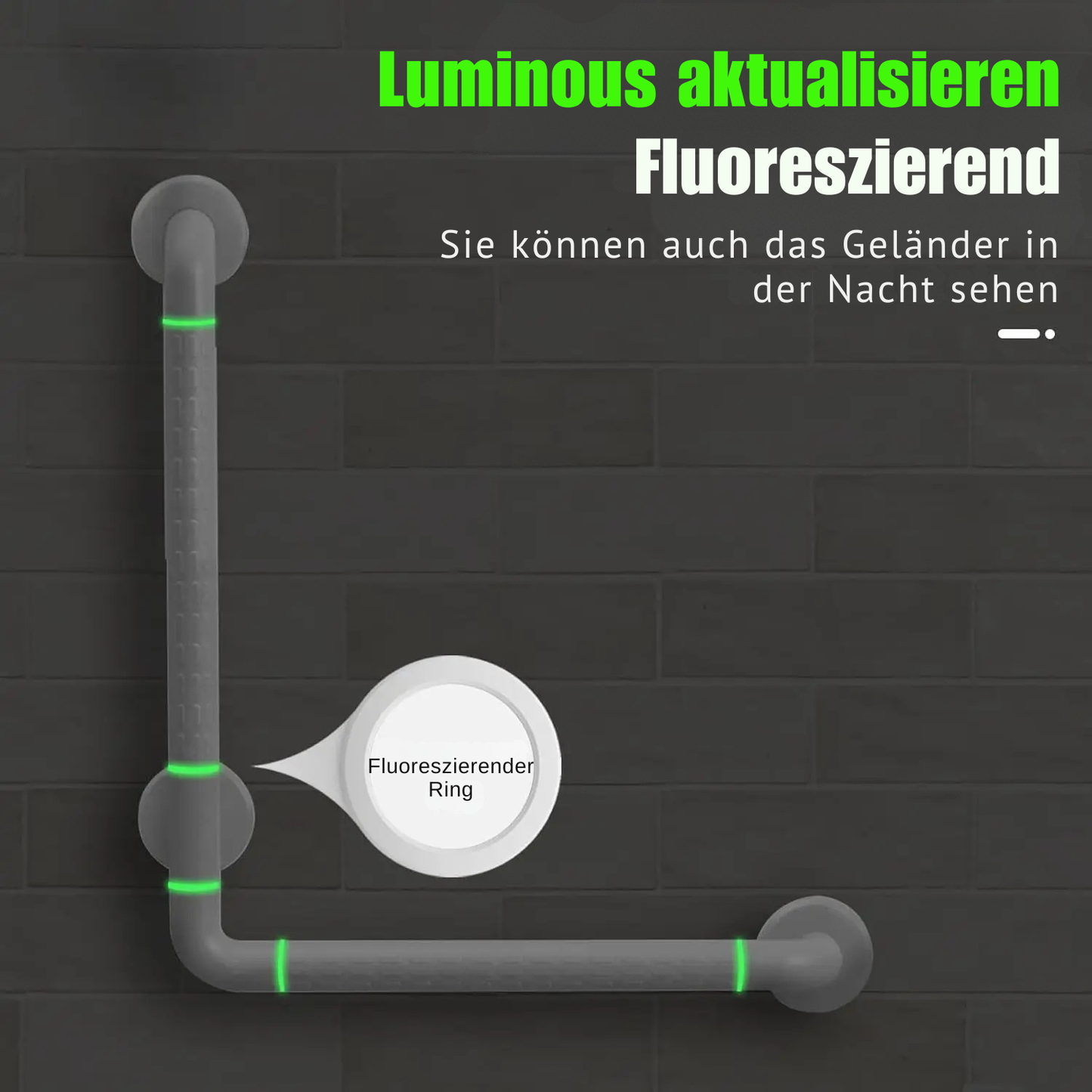 Grauer Haltegriff an dunkler Wand mit leuchtenden gruene Ringen fuer bessere Sichtbarkeit
